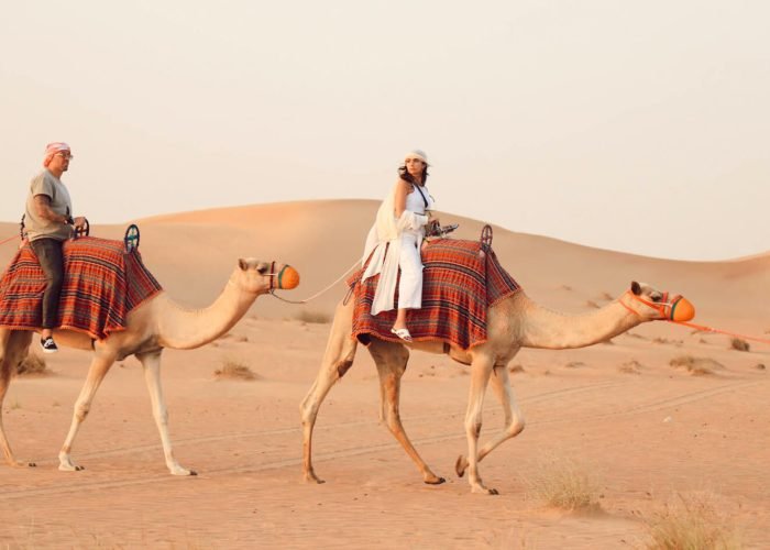 A-great-photo-of-some-tourists-riding-camels-on-a-safari-in-Hurghada