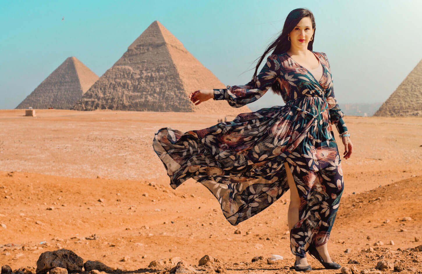 a-wonderful-shot-of-a-tourist-in-front-of-the-pyramids